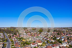 Aerial photo of the British town of Meanwood in Leeds West Yorkshire showing typical UK housing estates and rows of houses from