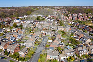 Aerial photo of the British town of Meanwood in Leeds West Yorkshire showing typical UK housing estates and rows of houses from