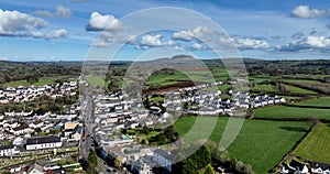 Aerial photo of Broughshane village Residential areas St Patricks Slemish Mountain in background Antrim N Ireland