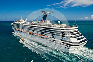 Aerial photo Carnival Conquest cruise ship departing Miami