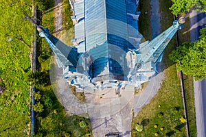 Aerial photo of a Catholic Church. Green. Spring time