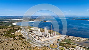 Aerial photo of a cement factory along the Berre lake in Port La Nouvelle