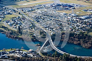 an aerial photo of the city, highway and surrounding area