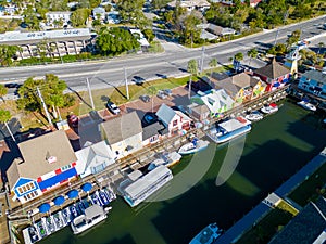 Aerial photo colorful dockside tourist shops and jet ski rentals Sarasota Beach FL