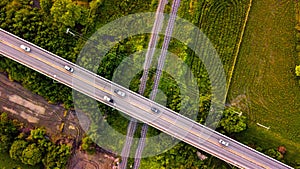 Aerial Photo Countryside Car Running on Road Bridge Over Railway