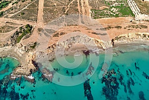 Aerial photo green Mediterranean Sea and arid land. Spain