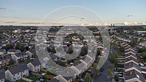 Aerial photo of housing estate in the Summer showing the tops of houses