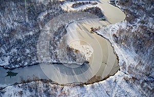 Aerial photo of Koen river under ice and snow. Beautiful winter landscape