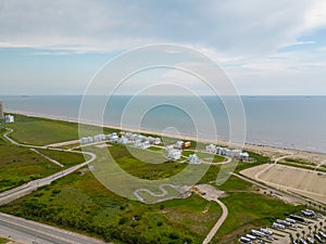 Aerial photo luxury vacation rentals on Galveston Beach Texas July 2022