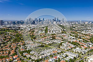 Aerial photo of Melbourne CBD and luxury homes