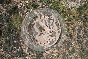 aerial photo of an old circular construction