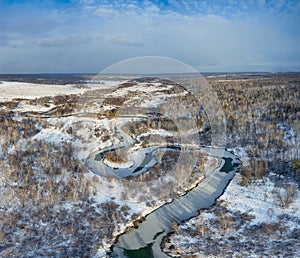 Aerial photo panorama of Koen river under ice and snow. Beautiful winter landscape