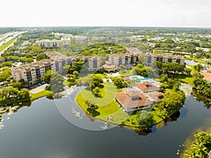 Aerial photo residential community with clubhouse and swimming pool