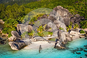 Aerial photo of Seychelles tropical beach Anse Source d`Argent at La Digue island, highlights Seychelles