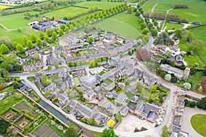 Aerial photo of the small village of Ripley in Harrogate, North Yorkshire in the UK showing the historical old stones cottages and