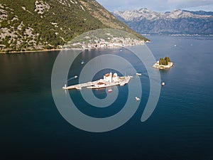 Aerial photo of St. George and monastery on the islands near Perast town in Kotor bay