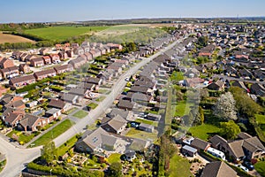 Aerial photo of the town of Kippax in Leeds West Yorkshire in the UK showing residential housing estates on a beautiful sunny