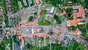 Aerial photo of a typical Polish hosing estate in the mountains towns, taken on a sunny part cloudy day using a drone, showing the
