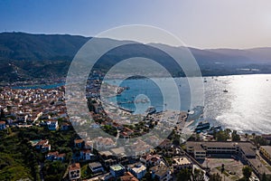 Aerial photo view of Poros Greece. Sunny day in Greek island. bay sea ships and yachts. Tourist destination