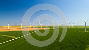 Aerial photo of wind turbines in the fields, Rye, Sussex