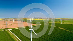 Aerial photo of wind turbines in the fields, Rye, Sussex