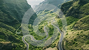 An aerial photograph showcasing the winding curves and twists of a mountain road surrounded by stunning natural scenery, A winding