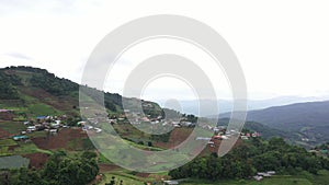 An aerial photographic view of Mon Jam Village in Chiangmai, filled with houses, resorts, and homestays for all the visitors.