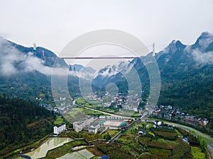 Aerial photography Aizhai Bridge over the clouds in Xiangxi, Hunan, China