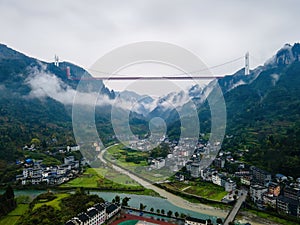 Aerial photography Aizhai Bridge over the clouds in Xiangxi, Hunan, China