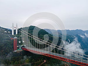 Aerial photography Aizhai Bridge over the clouds in Xiangxi, Hunan, China