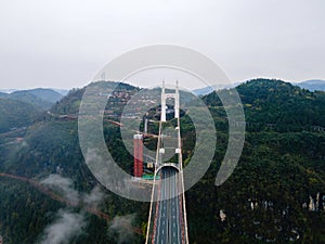 Aerial photography Aizhai Bridge over the clouds in Xiangxi, Hunan, China