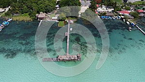 aerial photography with drone, pier on the shore of the sea of ??Bacalar in Mexico