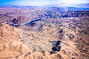 Aerial Photography of landforms over Arizona with Colorado River and Grand Canyon photo