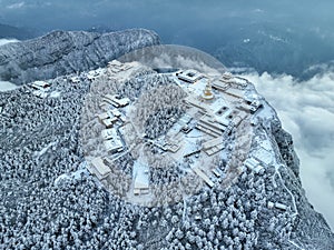 Aerial photography of snow covered Mount Emei in winter, the golden summit of Mount Emei in Sichuan(Huazang Temple)