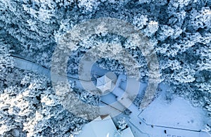 Aerial photography of snow covered Mount Emei in winter, the golden summit of Mount Emei in Sichuan(Huazang Temple)