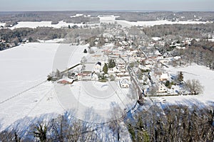 Aerial photography village of Saint-Cyr-sous-Dourdan under the snow in winter