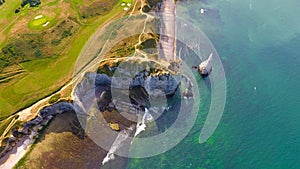 Aerial photography of the white chalk cliffs and arches in Etretat