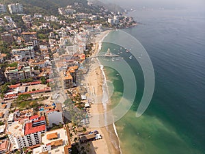 Aerial photos of the pier knows as Playa Los Muertos pier in the beautiful town of Puerto Vallarta in Mexico, the town is on the