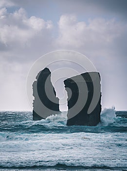 Aerial picture of wild rock formations in the middle of the open atlantic ocean next to Mosteiros, in Sao Miguel island