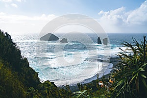 Aerial picture of wild rock formations in the middle of the open atlantic ocean next to Mosteiros, in Sao Miguel island