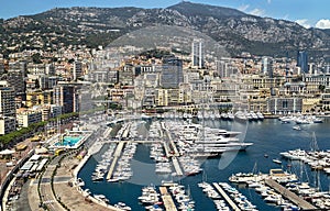 Aerial, picturesque view of La Condamine with yachts in luxury Monaco, French riviera.