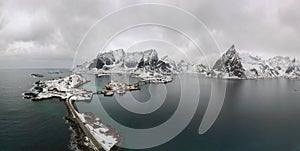 Aerial point of view of Lofoten.  Drone panorama landscape of Reine and Hamnoy fishing villages with fjords and mountains in the b