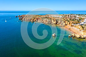 Aerial from Praia do Camillo on a rocky southcoast near Lagos in Portugal