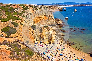 Aerial from Praia do Camillo on a rocky southcoast near Lagos in Portugal