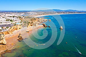 Aerial from Praia do Camillo on a rocky southcoast near Lagos in Portugal