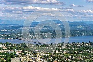 Aerial and remote view of Seattle Leschi with the Lacey V Murrow Bridge over Lake Washington and the Mercer Island and Bellevue,