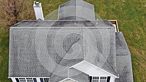 Aerial Residential Roof and Chimney Inspection by Drone, Entire Roofline and House photo
