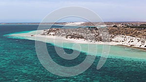 Aerial Reveal of Bill's Bay in Coral Bay section of Ningaloo Reef seen from above. Western Australia Tourism. A