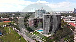 Aerial reveal buildings in Coconut Grove Miami FL