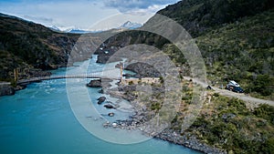 aerial of Rio Baker with white water rapids and turquoise river along the Carretera Austral, Patagonia, Chile.